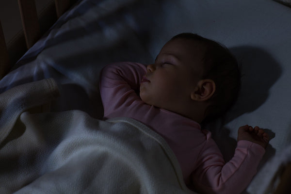 Does my baby need a dark room to sleep?